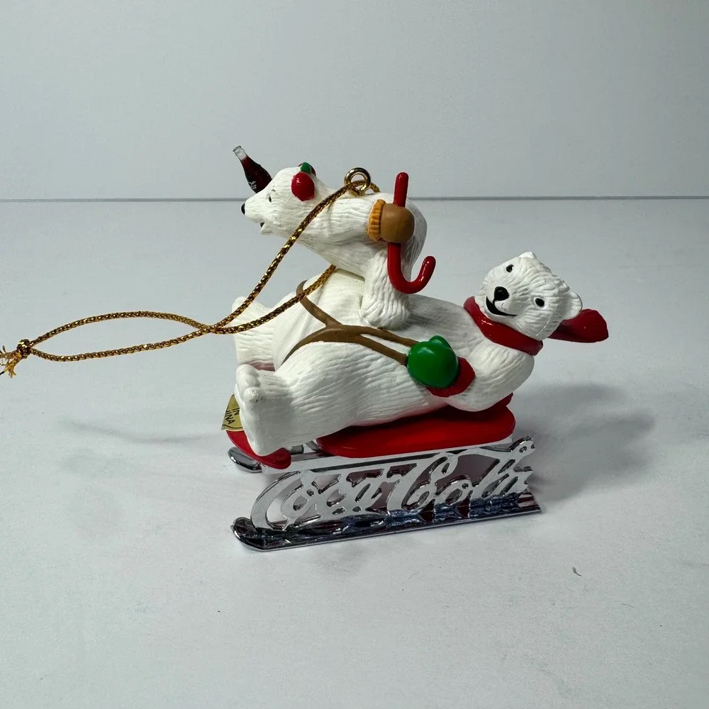 Vintage 1997 Coca-Cola Polar Bears Sledding Christmas Ornament Silver Logo Base